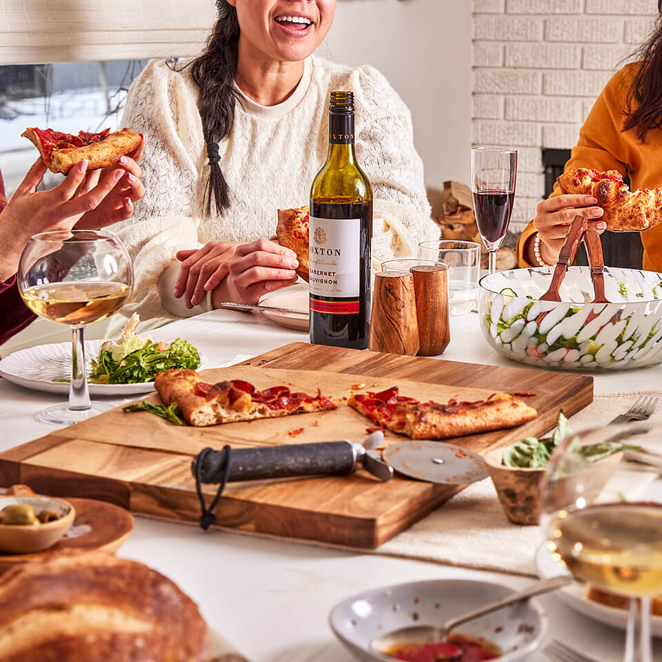 A group of people eating dinner together