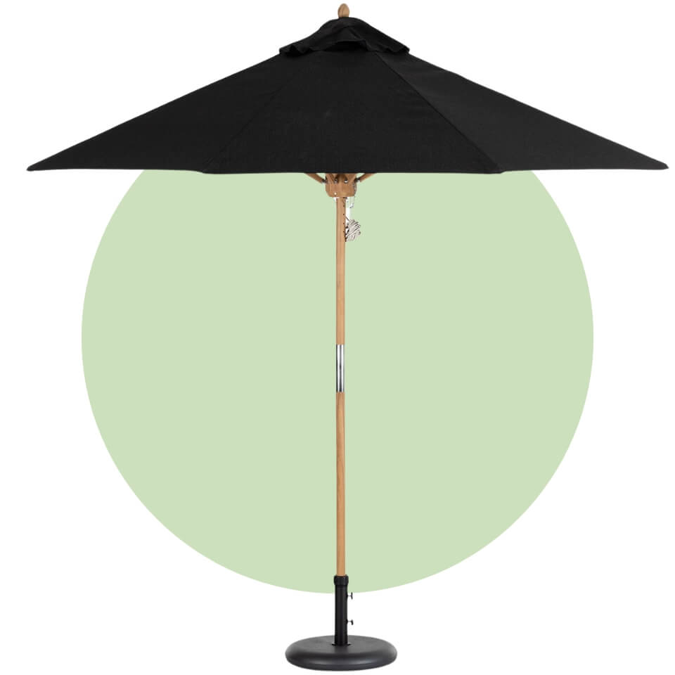 An umbrella with a black canopy and light wooden pole over a light green circle