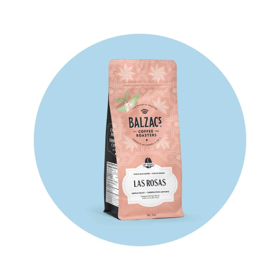 A pink bag of coffee inside a light blue circle