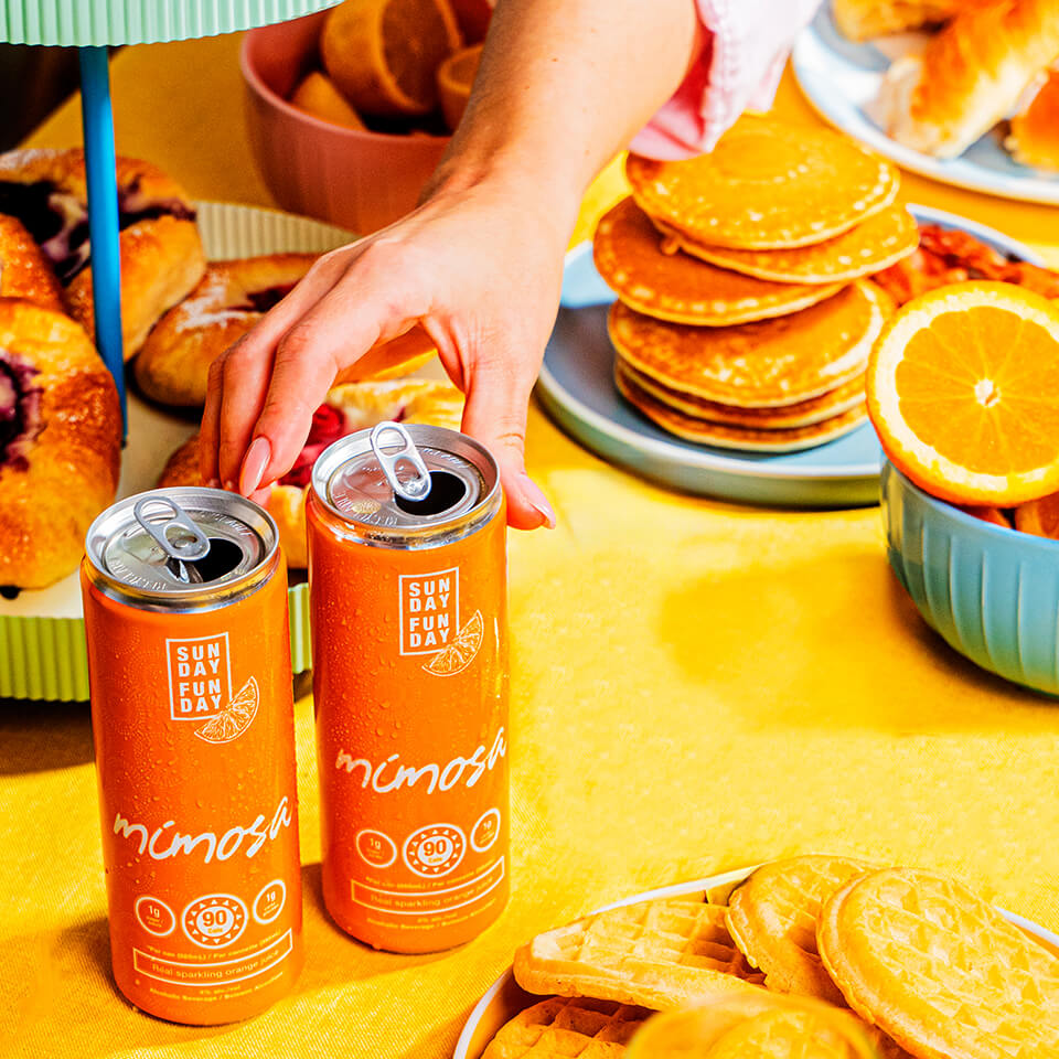 orange cans of soda