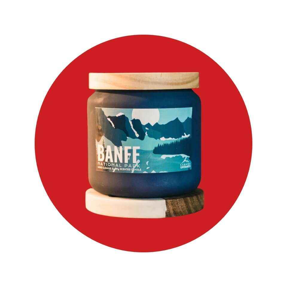 A Banff-themed scented candle in a red circle