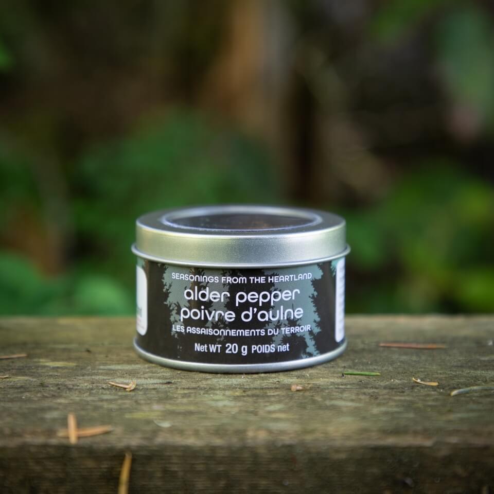 A small silver tin of pepper