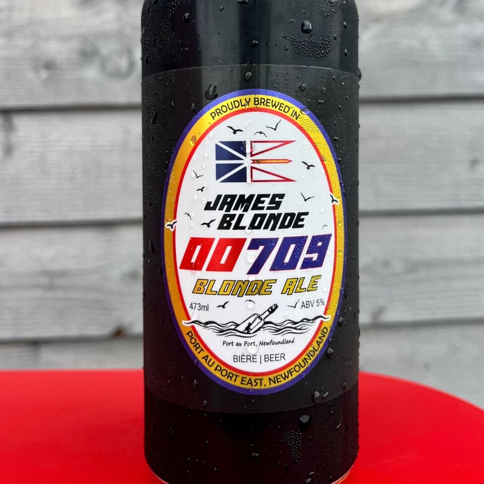 A black tall can of beer