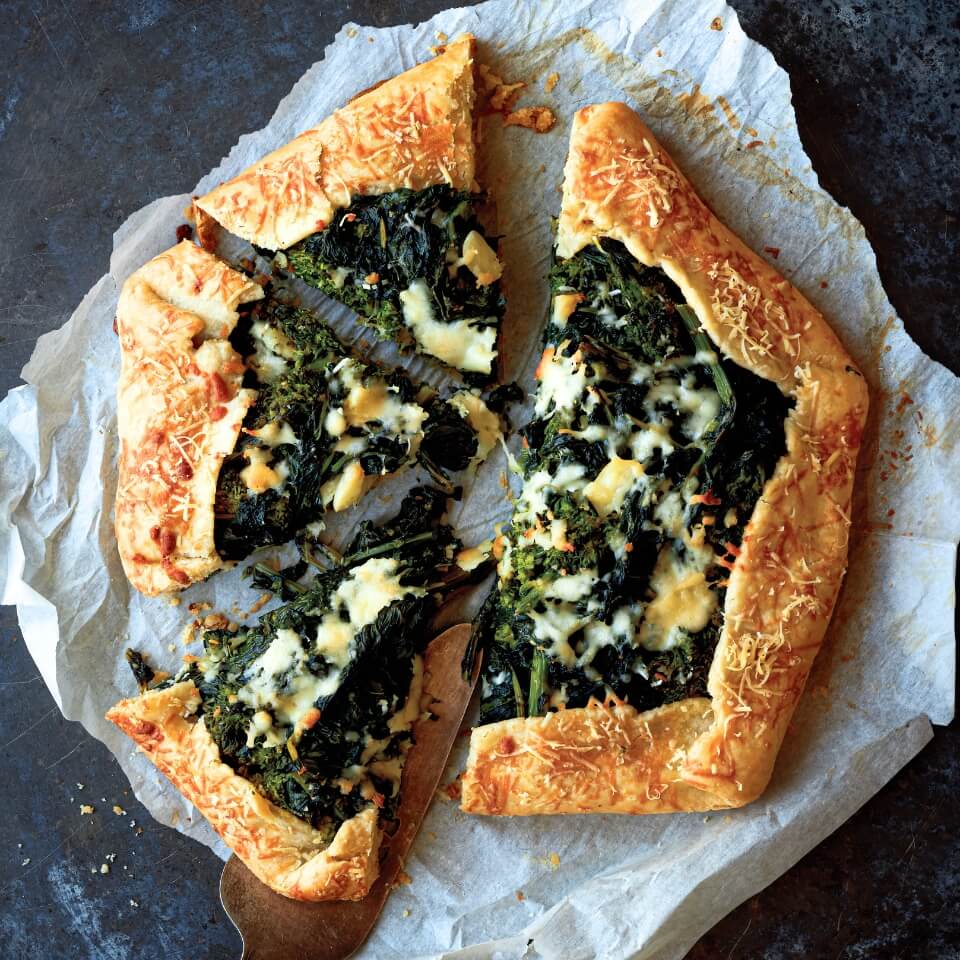 A rapini galette on parchment paper