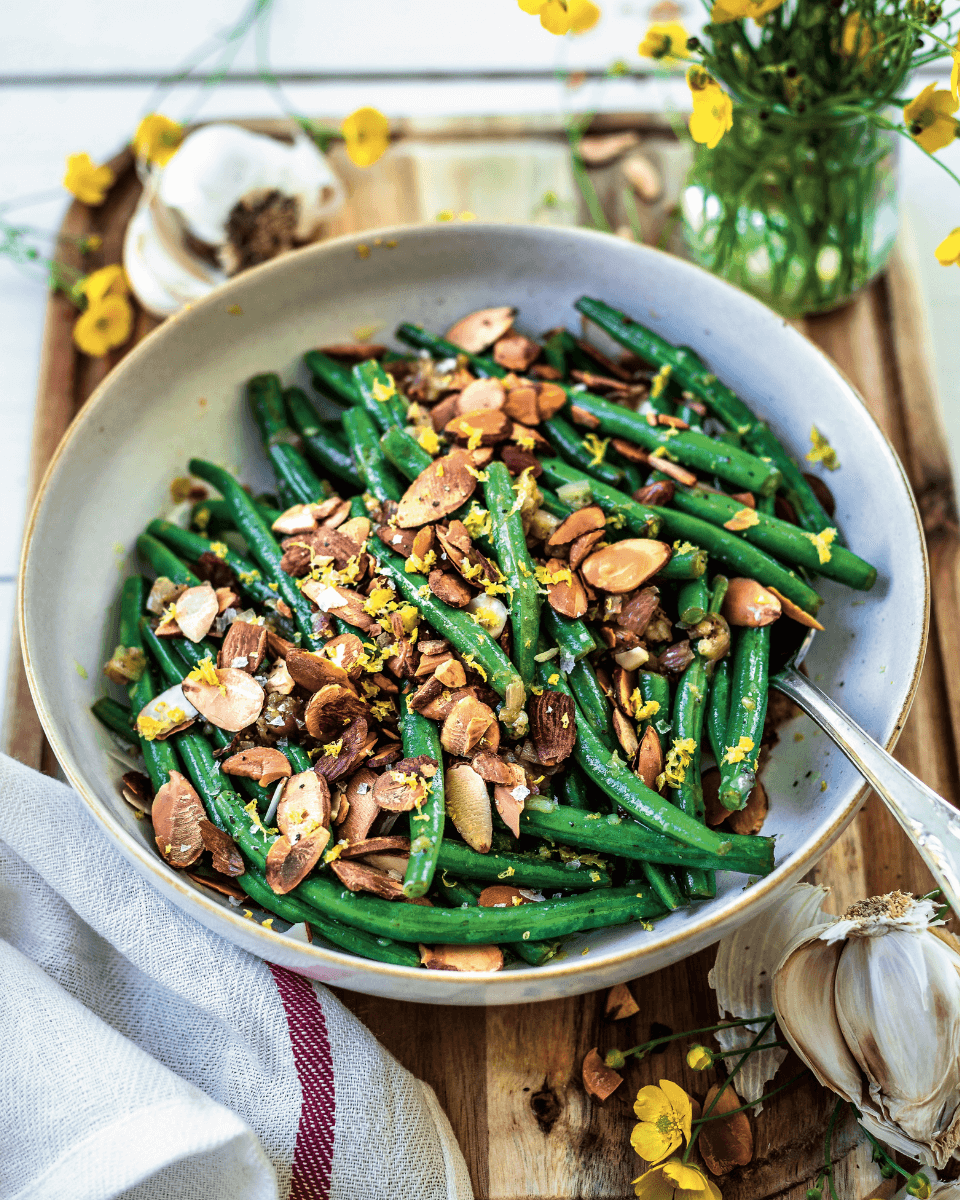 Bowl of green beans with almonds