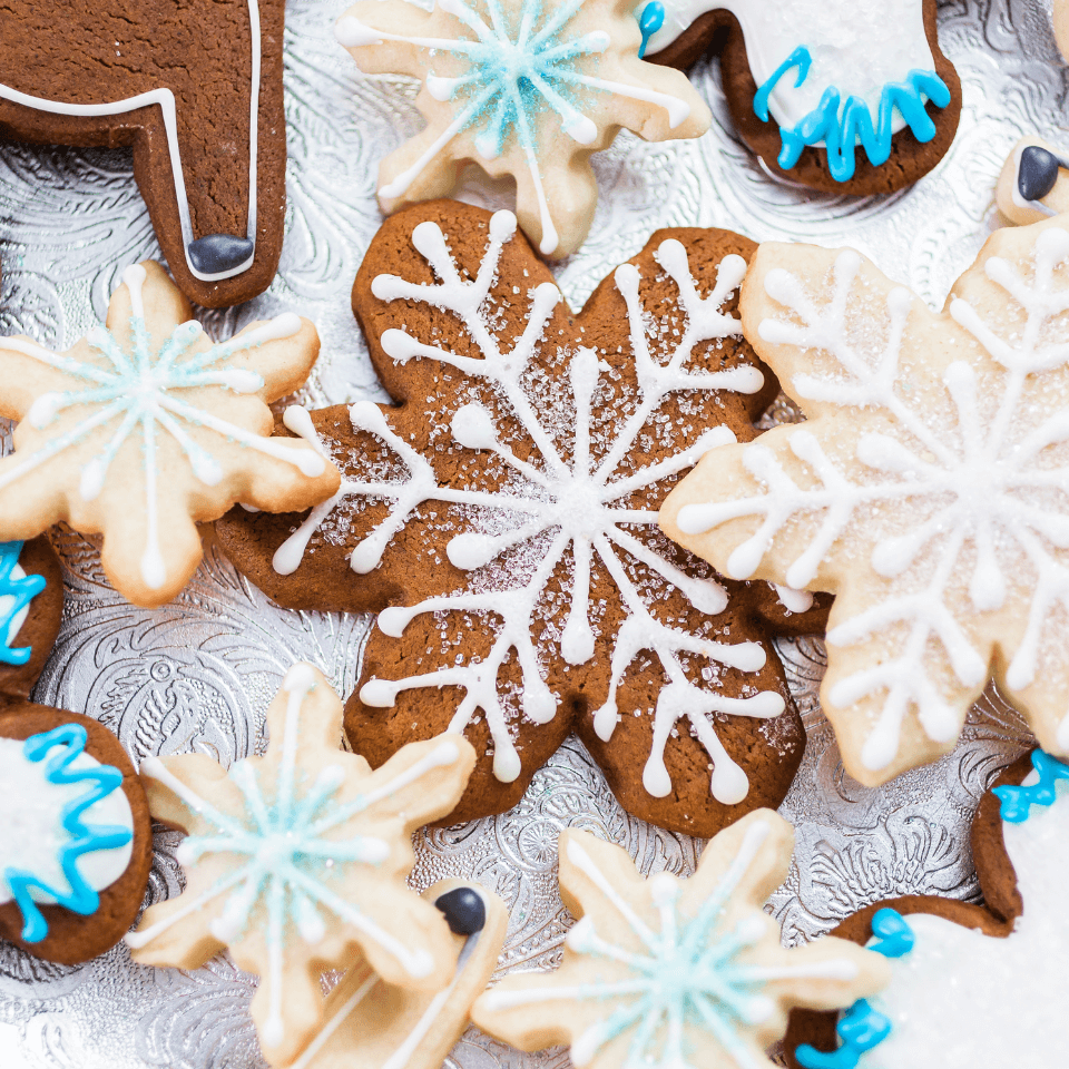 gingerbread and sugar cookies with icing piped