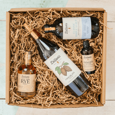 box with four bottles of alcohol