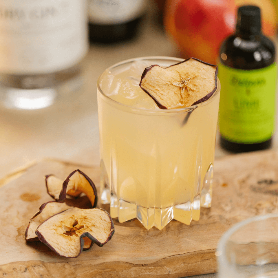 Glass with cider and dried apples