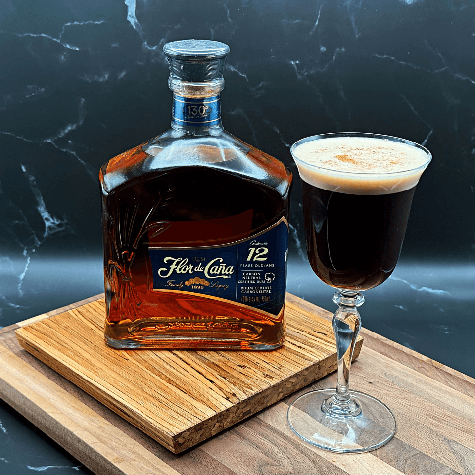 Bottle of Flor de Caña Centenario 12-Year Rum and a Rum Espresso Martini Cocktail