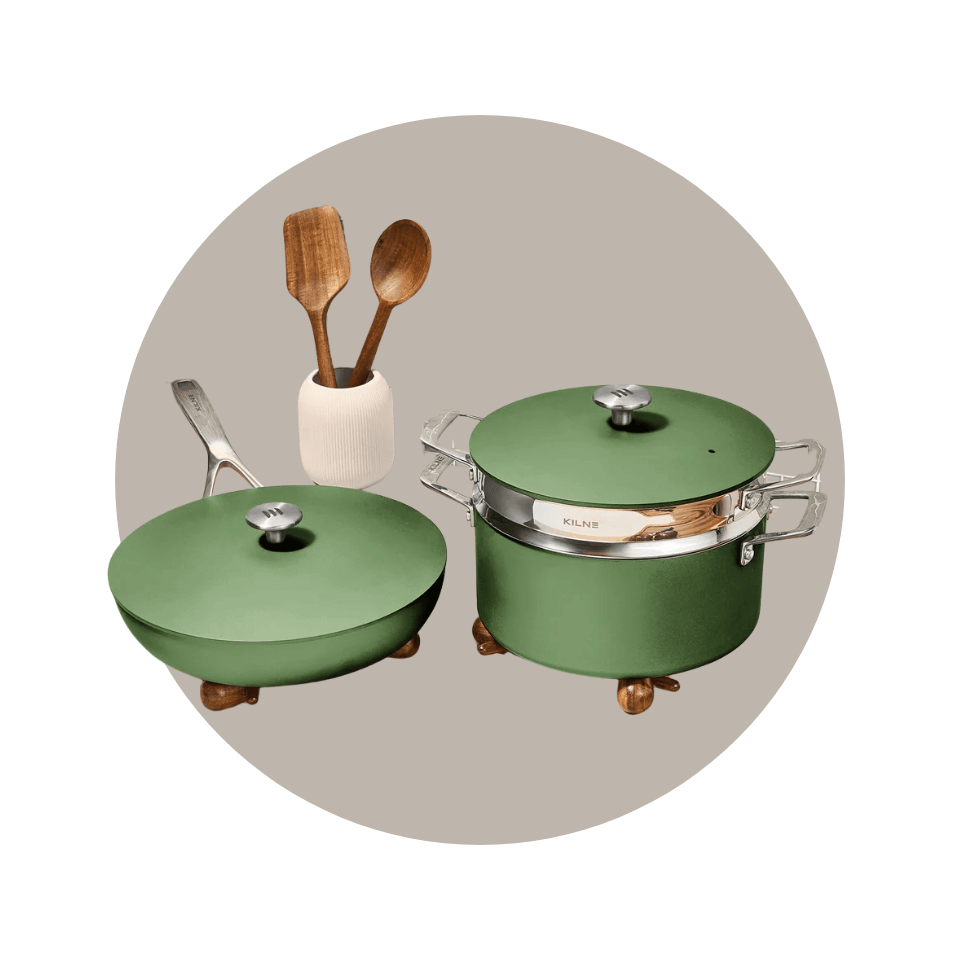 Two green pots with vase and wooden spoons