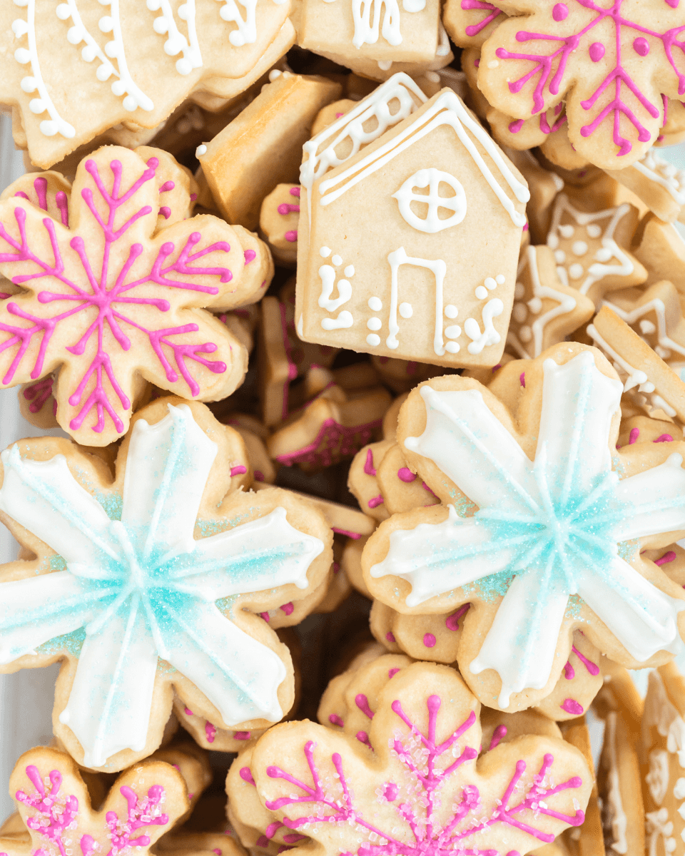 stacks of sugar cookies with piped icing