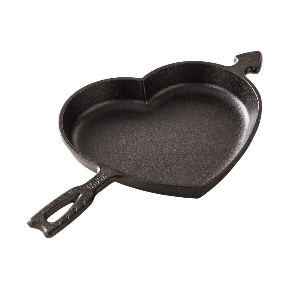 A seasoned cast-iron pan in the shape of a heart