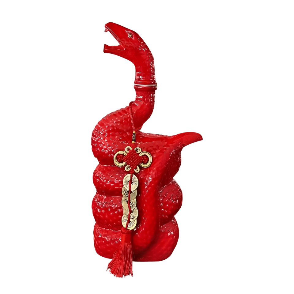 Red coiled snake shaped decanter with Skorpios Tequila