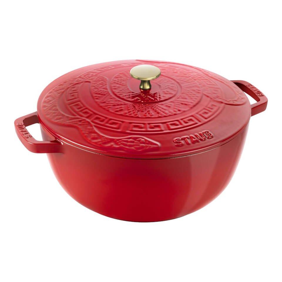 Red Staub braiser with embossed wood snake pattery for Lunar New Year