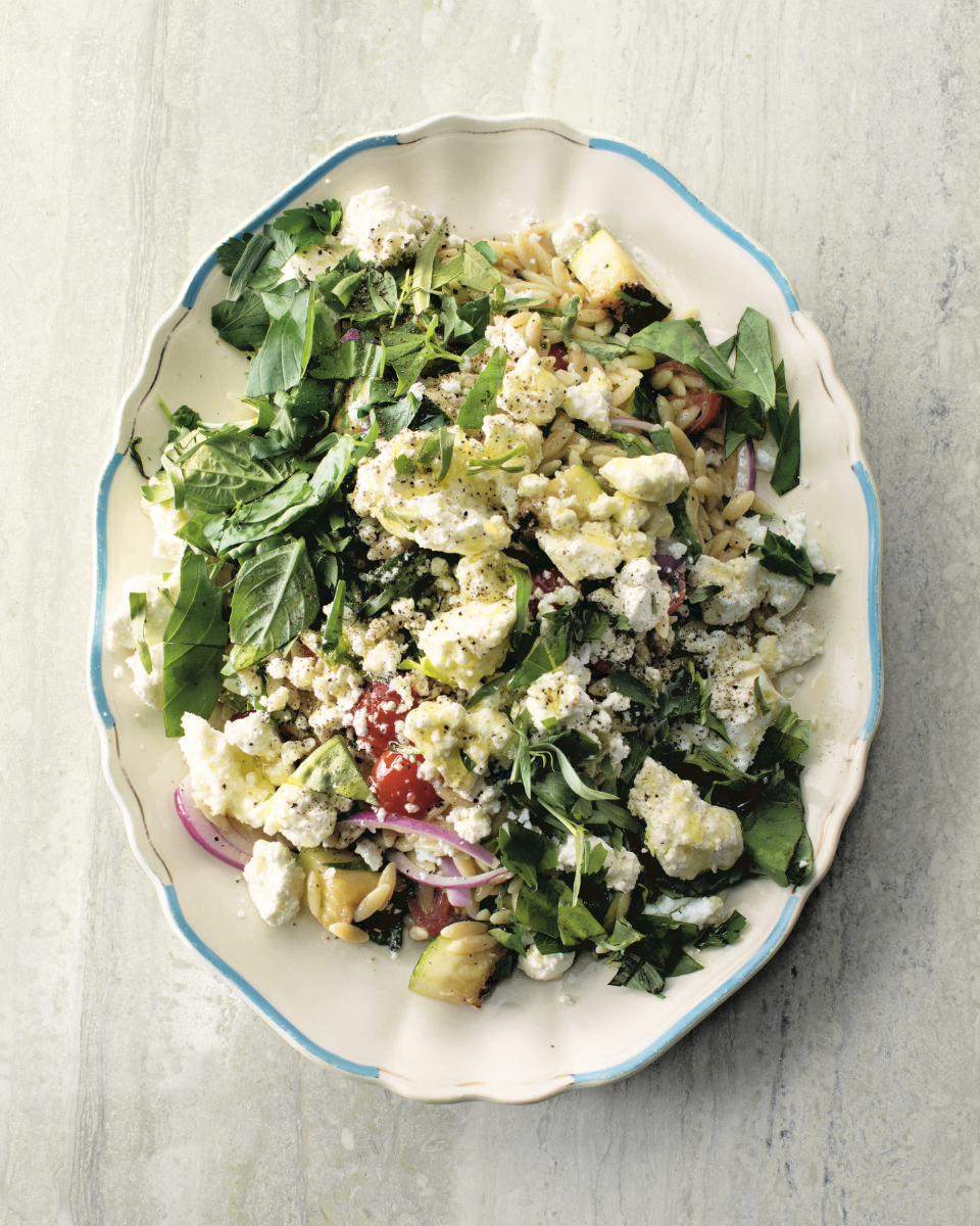 A recipe image for Matty Matheson's Orzo and Goat Cheese Salad.