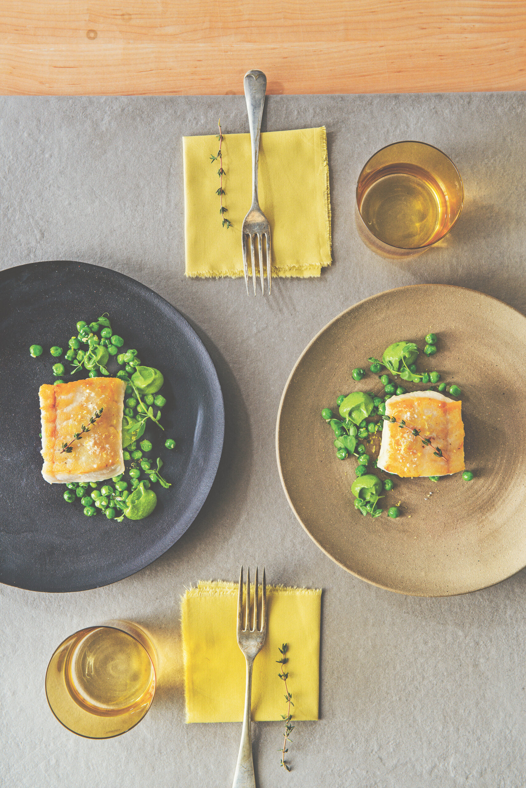Pan seared halibut fillets with spring peas and a spinach-pea purée
