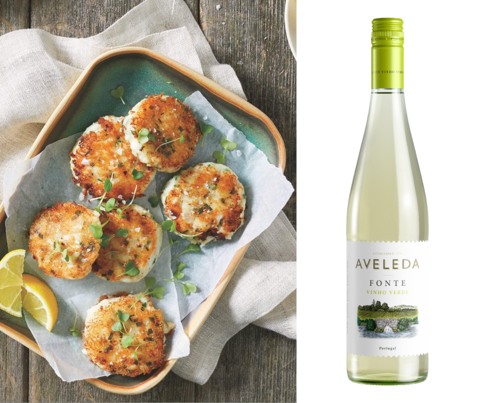 PEI fish cake recipe is set up for eating alongside a bottle of wine