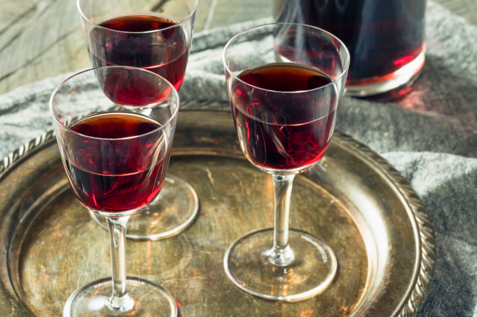 crystal stemmed glasses filled with authentic Portugues port