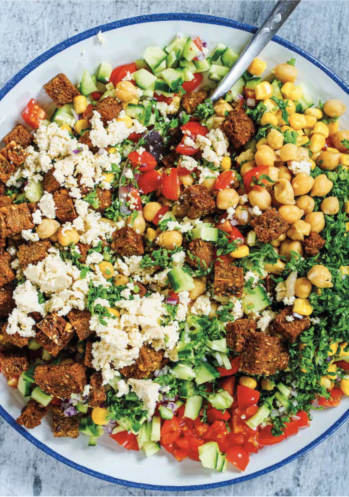 Image of Jerusalem salad recipe made with tofu and chickpeas.