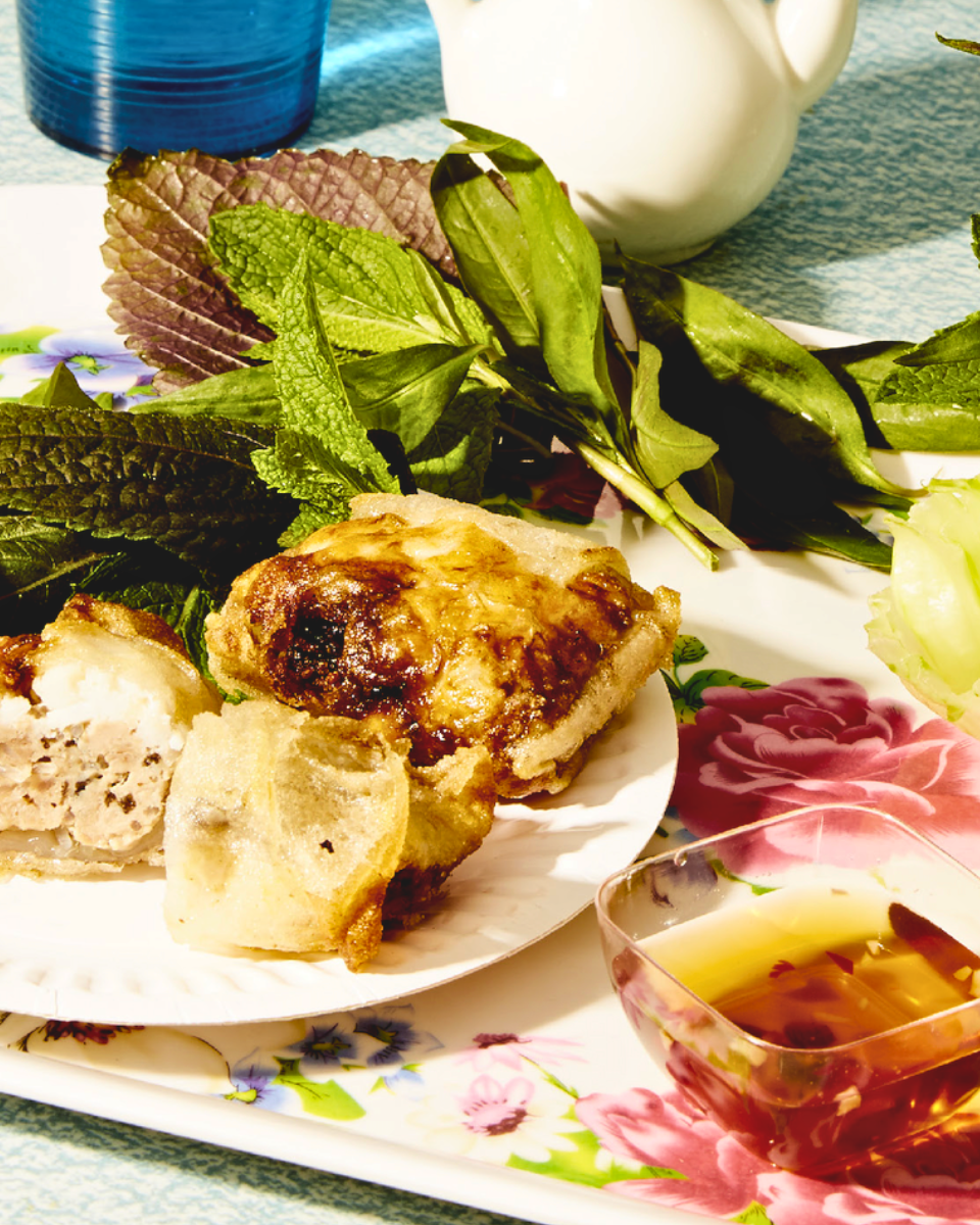 Vietnamese recipe for Crab and Pork Spring Rolls, served with salad and sauce