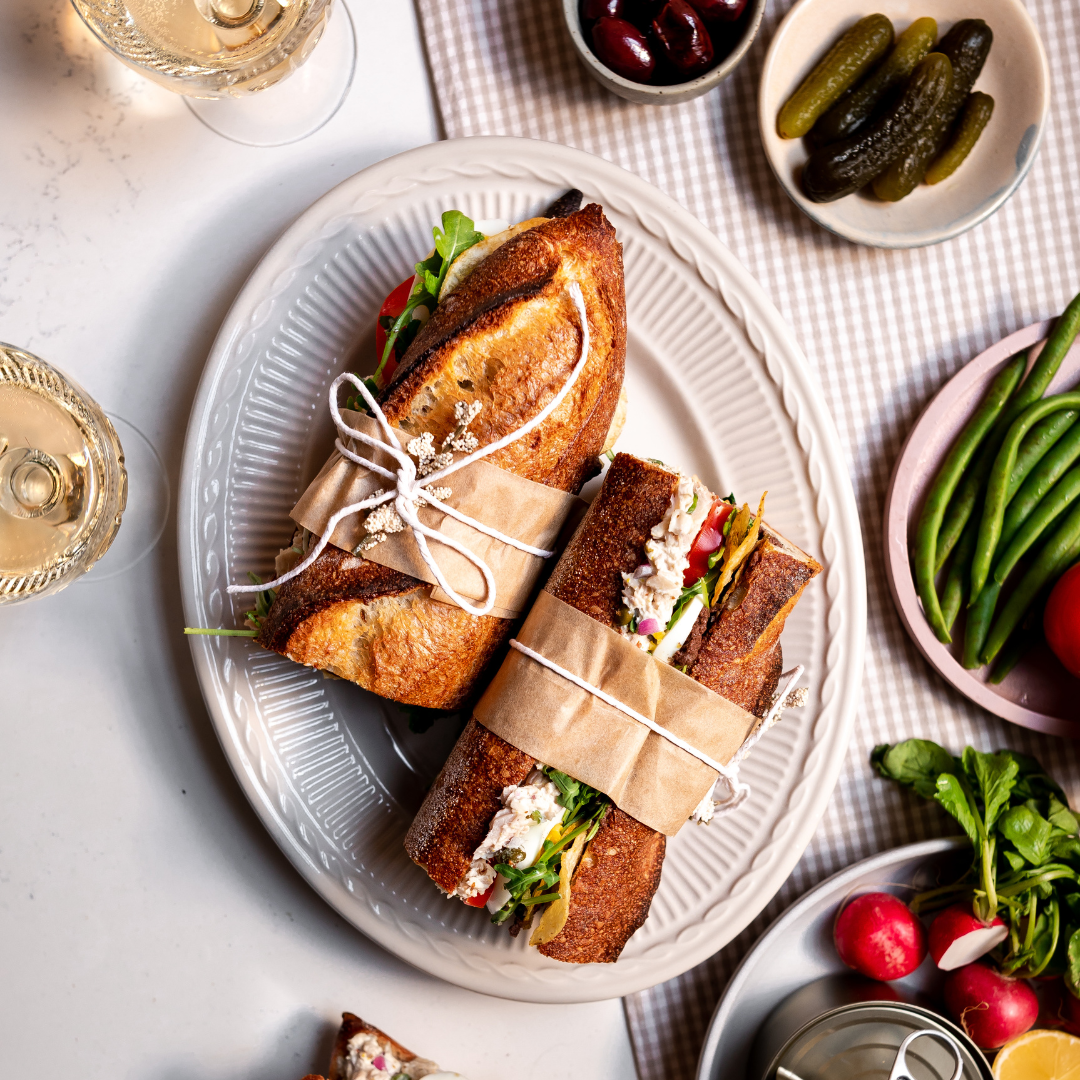 Tuna nicoise on baguette, tied with butcher's twine