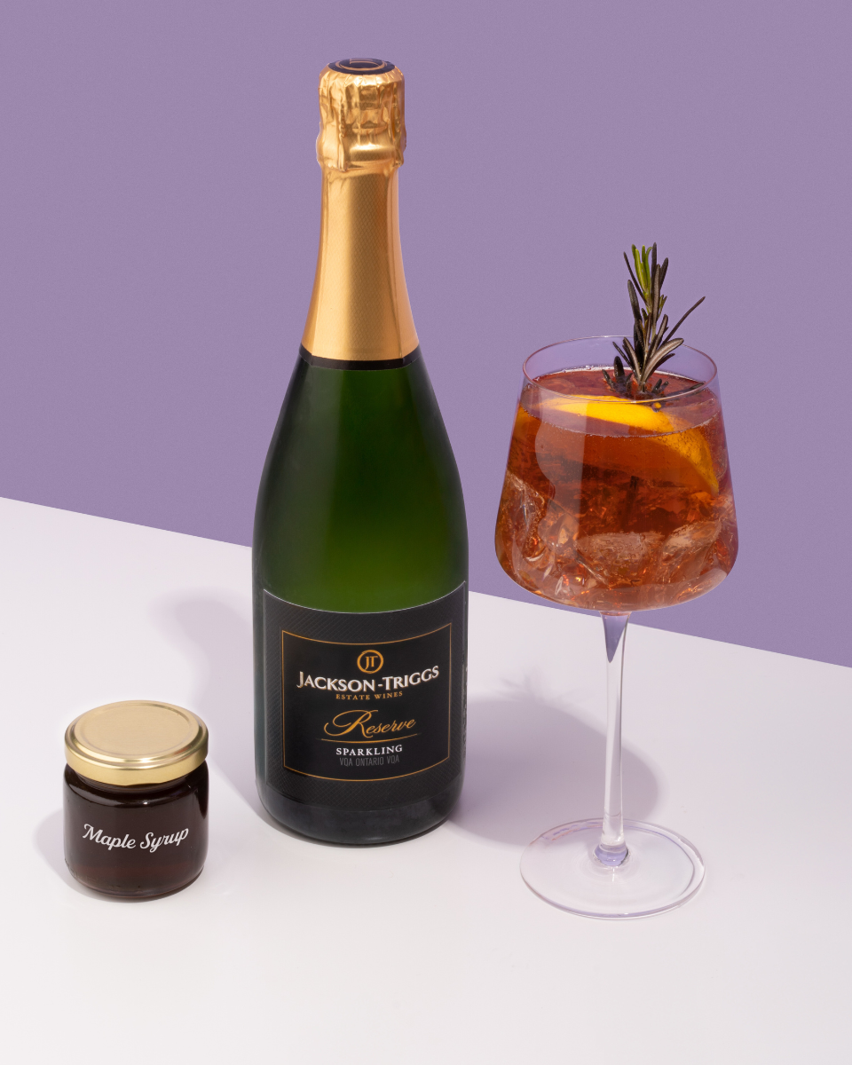 Canadian made bottle of Jackson-Triggs Sparkling Reserve with a Cocktail_ Canadian Spritz
