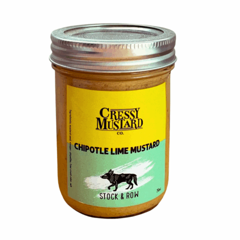 A mason jar filled with yellow Cressy Mustard.