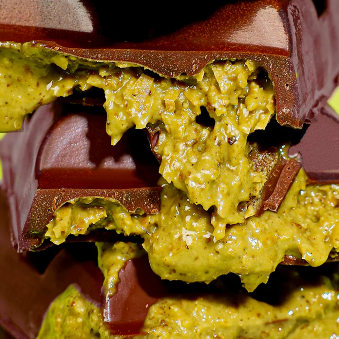 Close-up of dubai chocolate bars with the pistachio filling oozing out.