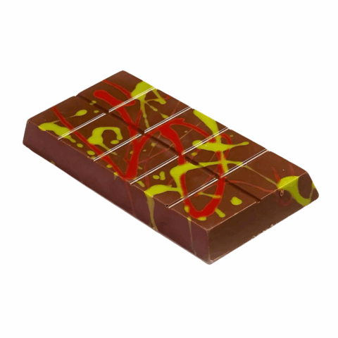 A chocolate bar with a decorative red and green swirl pattern on top.