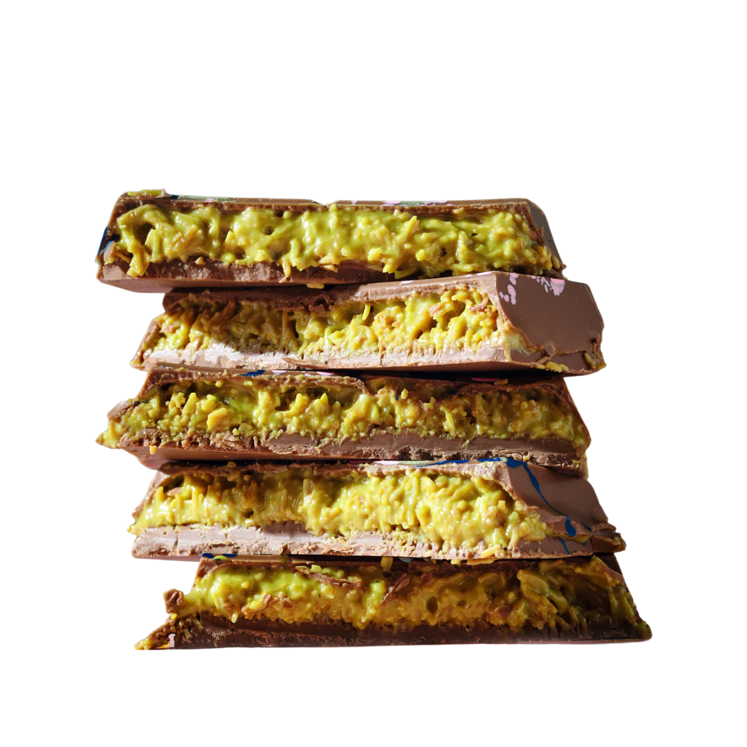 Dubai chocolate bars broken in half to show the pistachio knafeh filling inside.