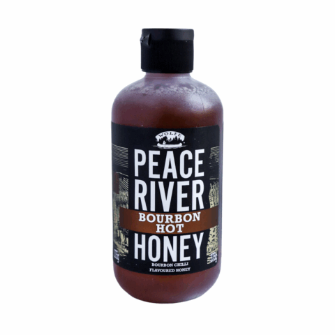 Dark bottle of Peace River Honey Bourbon Hot honey.