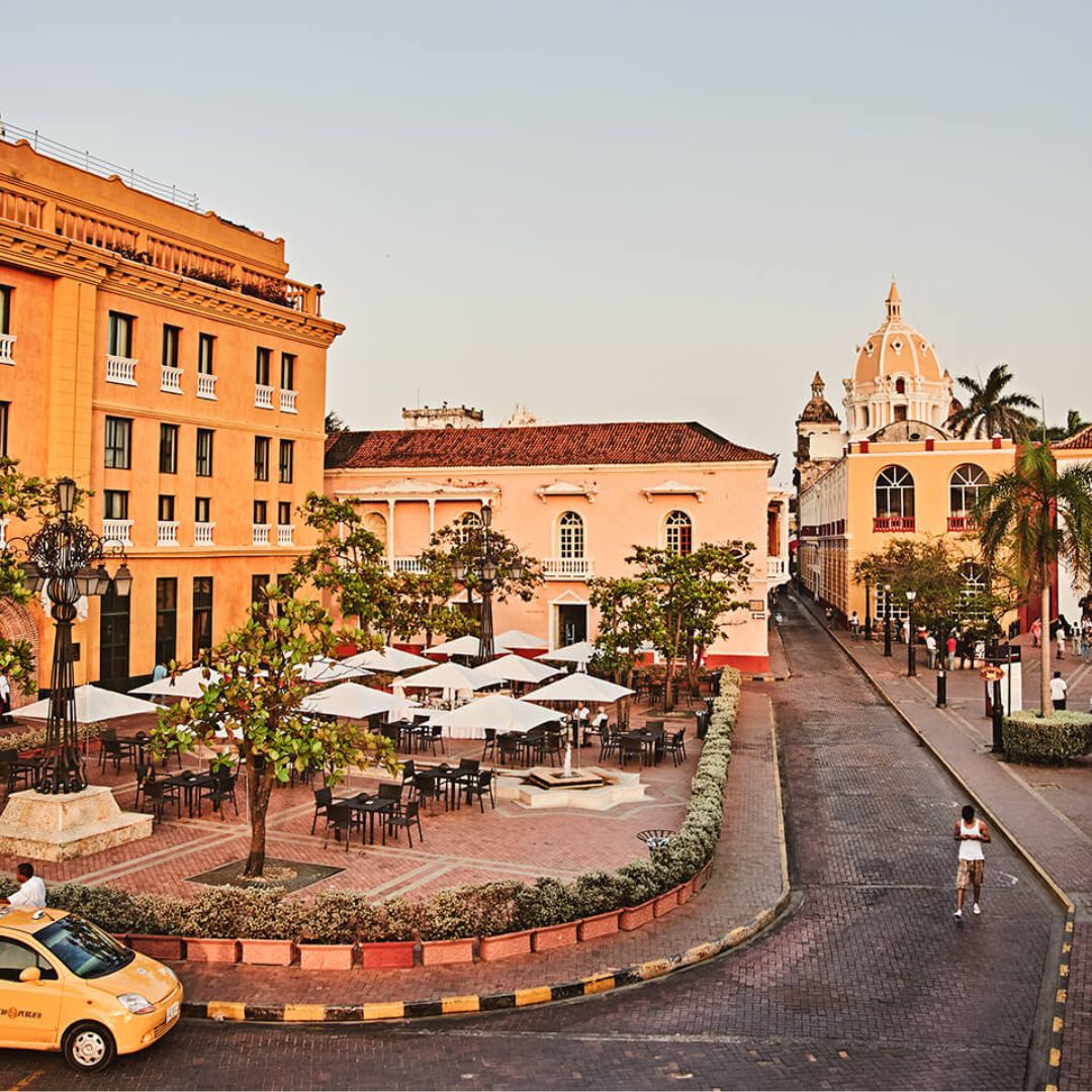 Colourful Spanish colonial-style buildings in a town.