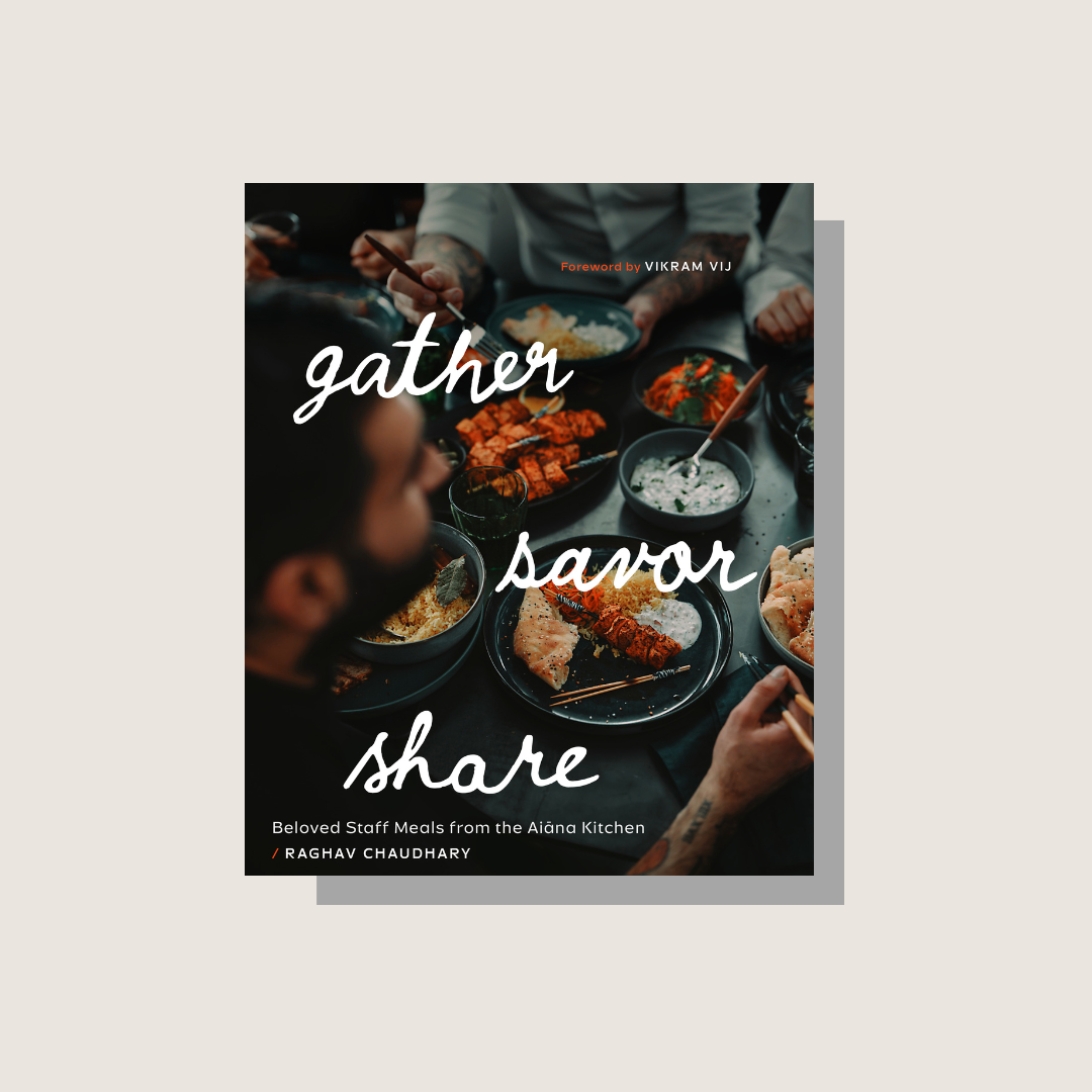 The cookbook cover for Gather, Savor, Share with a beige background.