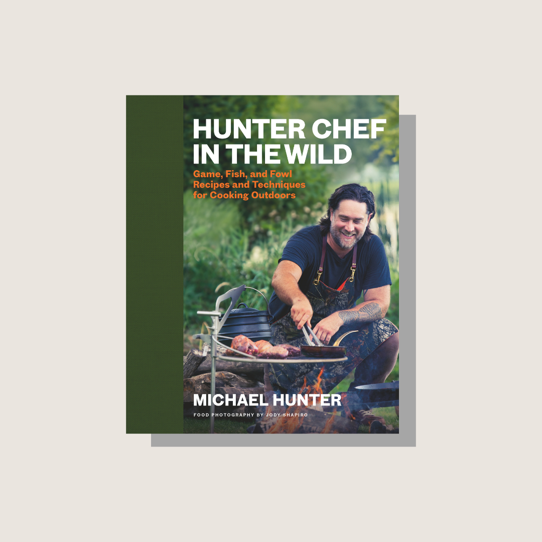 The cover of the Hunter Chef in the Wild cookbook on a beige background.