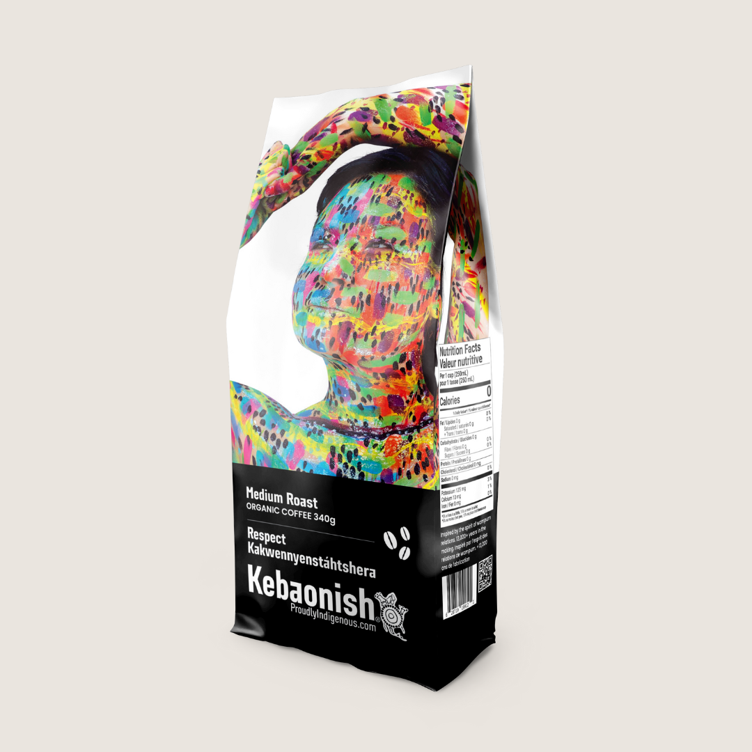 A bag of coffee featuring a person's painted face and body on the design.