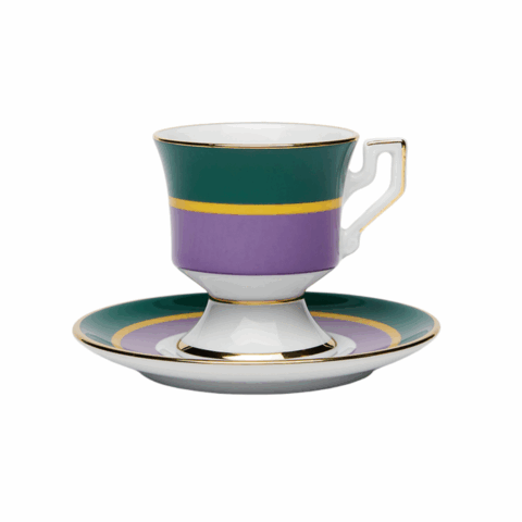 A purple, green and yellow striped espresso cup on a matching saucer.