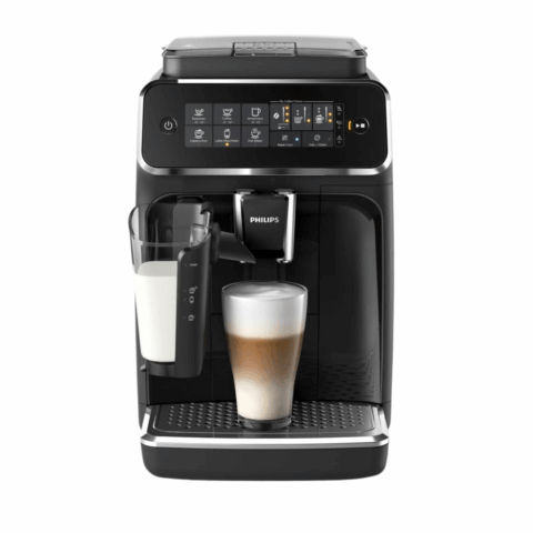 A black espresso machine with a shot of foamy espresso on the base.