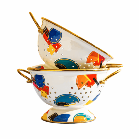 Two colourful enamel colanders stacked on top of each other.