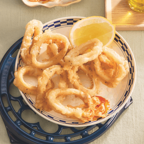 Dish of Calamari Fritto misto with lemon