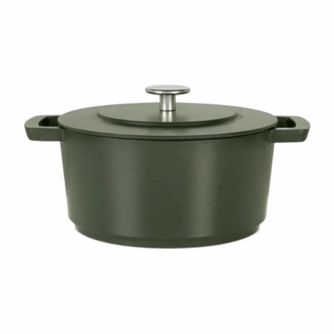 Dark green dutch oven with silver top handle on lid.