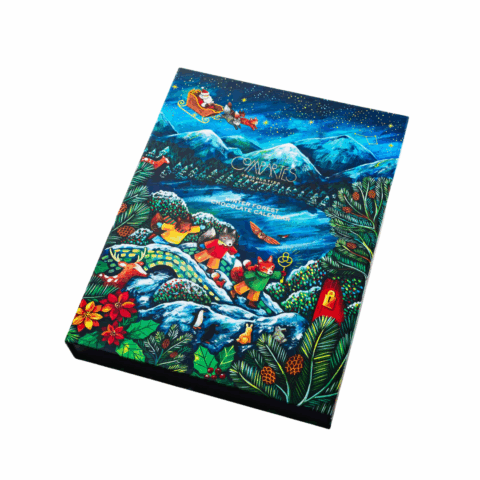 An advent calendar with a decorative illustration of foxes in the forest.