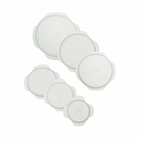 Six clear round silicone lids.