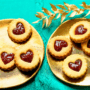 One of the most popular Christmas cookies, Linzer Cookies With Strawberry Jam and heart shaped cutouts