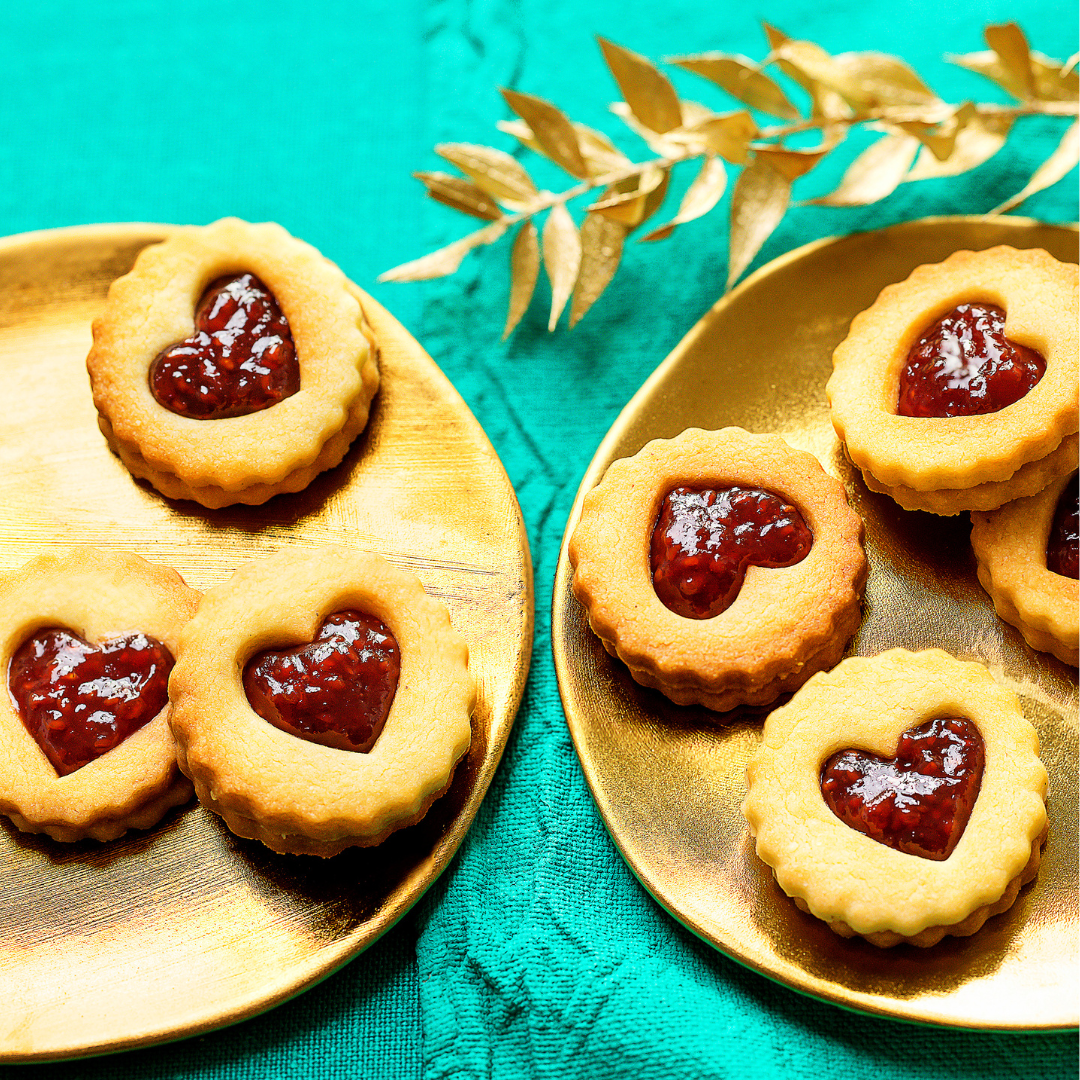 One of the most popular Christmas cookies, Linzer Cookies With Strawberry Jam and heart shaped cutouts