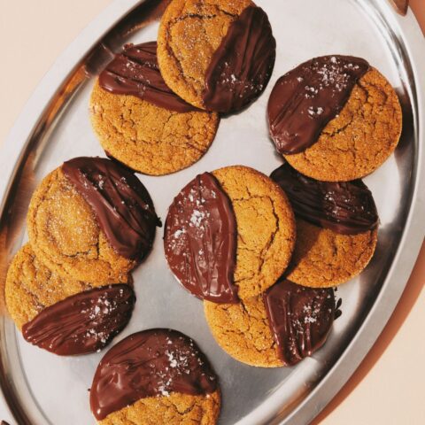 A tray of chewy gingerbread chocolate-dipped cookies